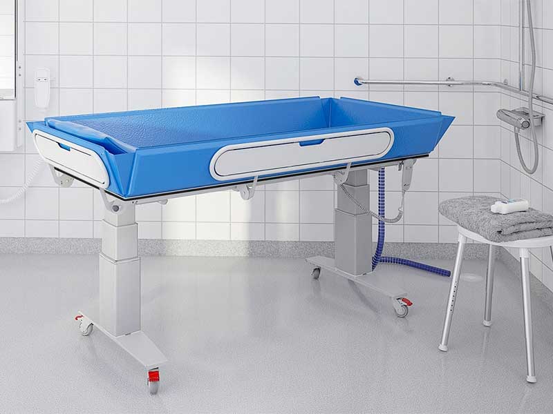Pflegeliege 345 - höhenverstellbarer Pflegetisch mit klappbaren Seitenteilen