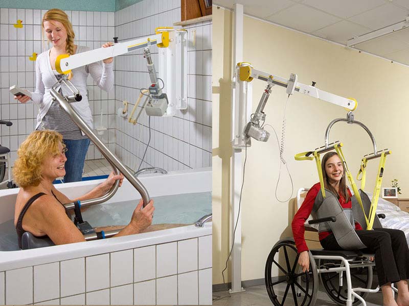 Patientinnen werden mit dem Lifter in die Wanne bzw. den Rollstuhl gehoben