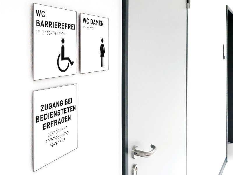 Türschilder für barriefreies WC und Damen-WC mit Piktogrammen und Braille